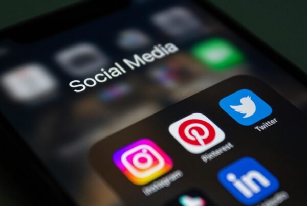 A smartphone screen displaying popular social media applications like Instagram and Twitter.