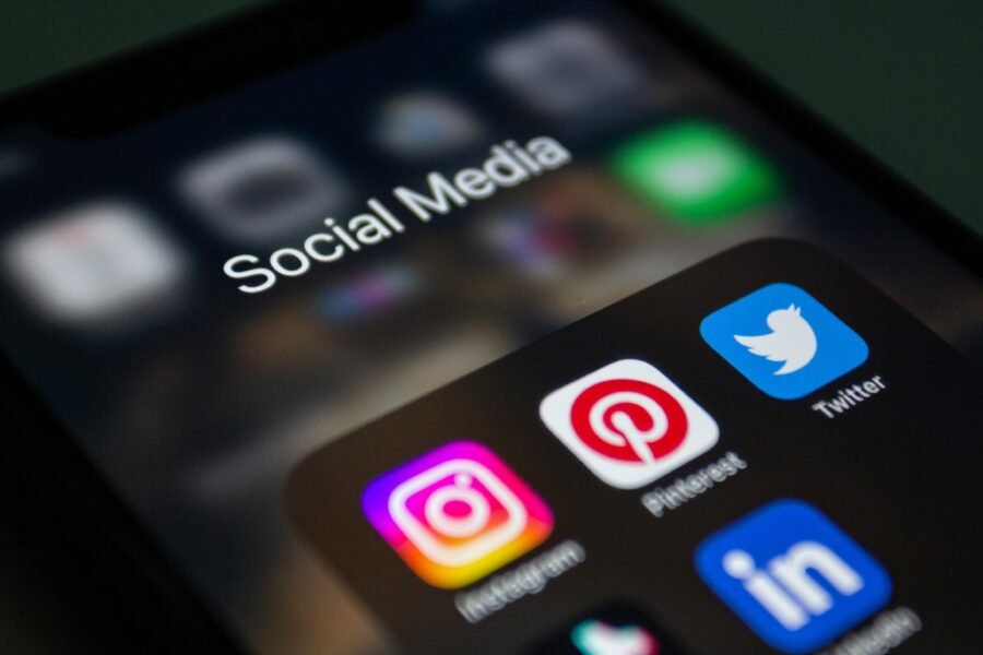 A smartphone screen displaying popular social media applications like Instagram and Twitter.